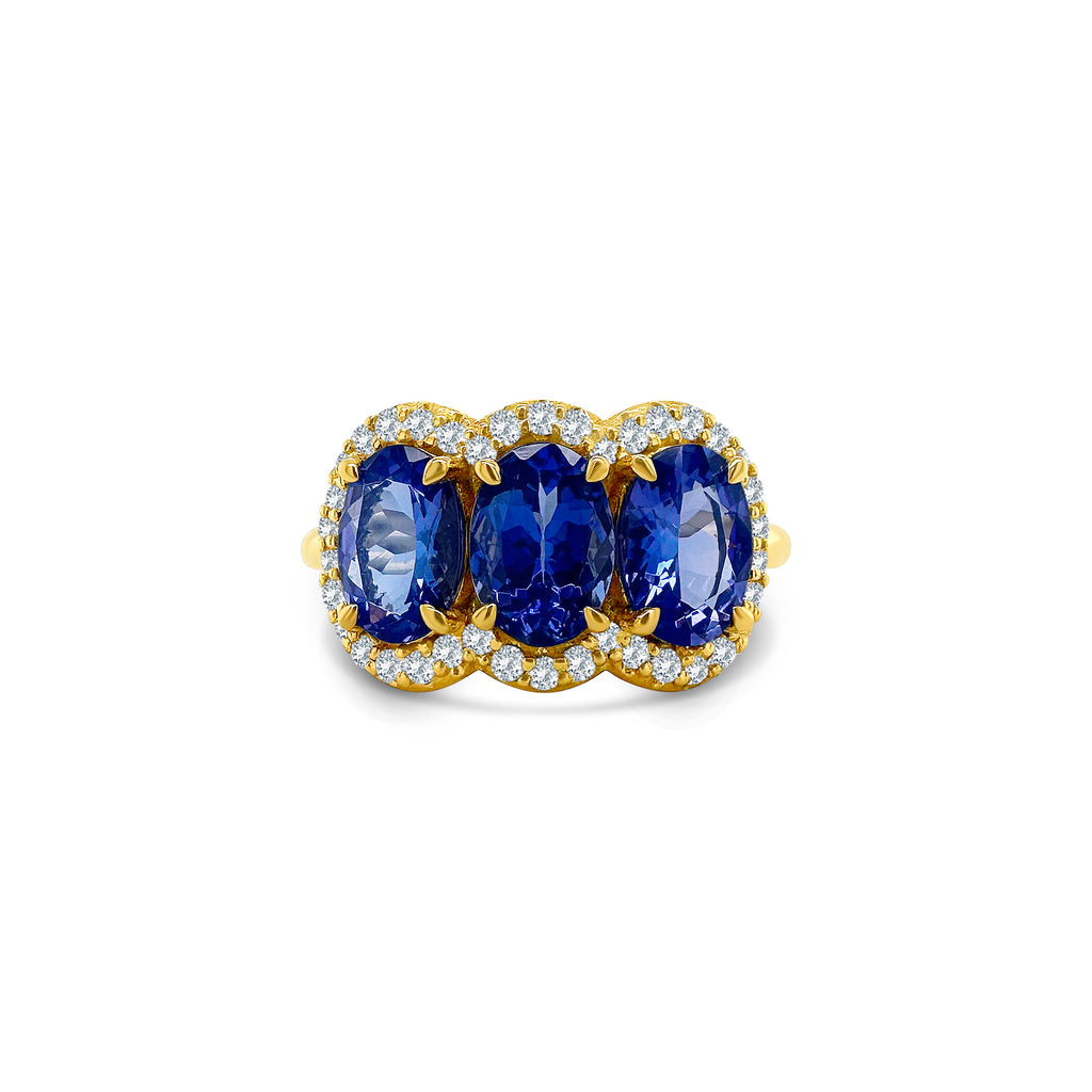 "Oval Cut Tanzanite Diamond Halo Ring," "Tanzanite Halo Ring," "Diamond Halo Ring," "Fine Jewelry," "Luxury Ring," "Fashion Ring," "Tanzanite Jewelry," "Sparkling Halo Ring," "Statement Ring," "Elegant Jewelry," "Special Occasion Ring," "Tanzanite and Diamond Ring," "Timeless Jewelry," "Handcrafted Tanzanite Ring," "Gemstone Halo Ring."