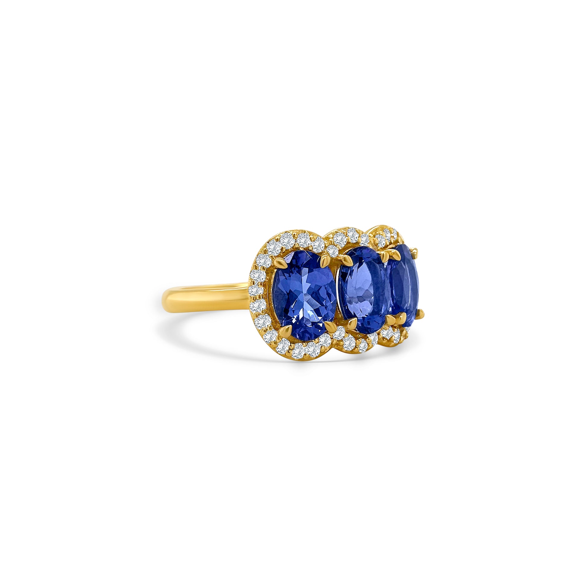 "Oval Cut Tanzanite Diamond Halo Ring," "Tanzanite Halo Ring," "Diamond Halo Ring," "Fine Jewelry," "Luxury Ring," "Fashion Ring," "Tanzanite Jewelry," "Sparkling Halo Ring," "Statement Ring," "Elegant Jewelry," "Special Occasion Ring," "Tanzanite and Diamond Ring," "Timeless Jewelry," "Handcrafted Tanzanite Ring," "Gemstone Halo Ring."