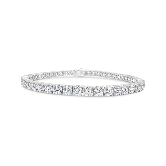 A stunning diamond tennis bracelet, featuring brilliant diamonds, perfect for any occasion, adding elegance and glamour to your look, a timeless accessory, sparkling with every movement, exuding sophistication and luxury, a must-have piece for every jewelry collection.