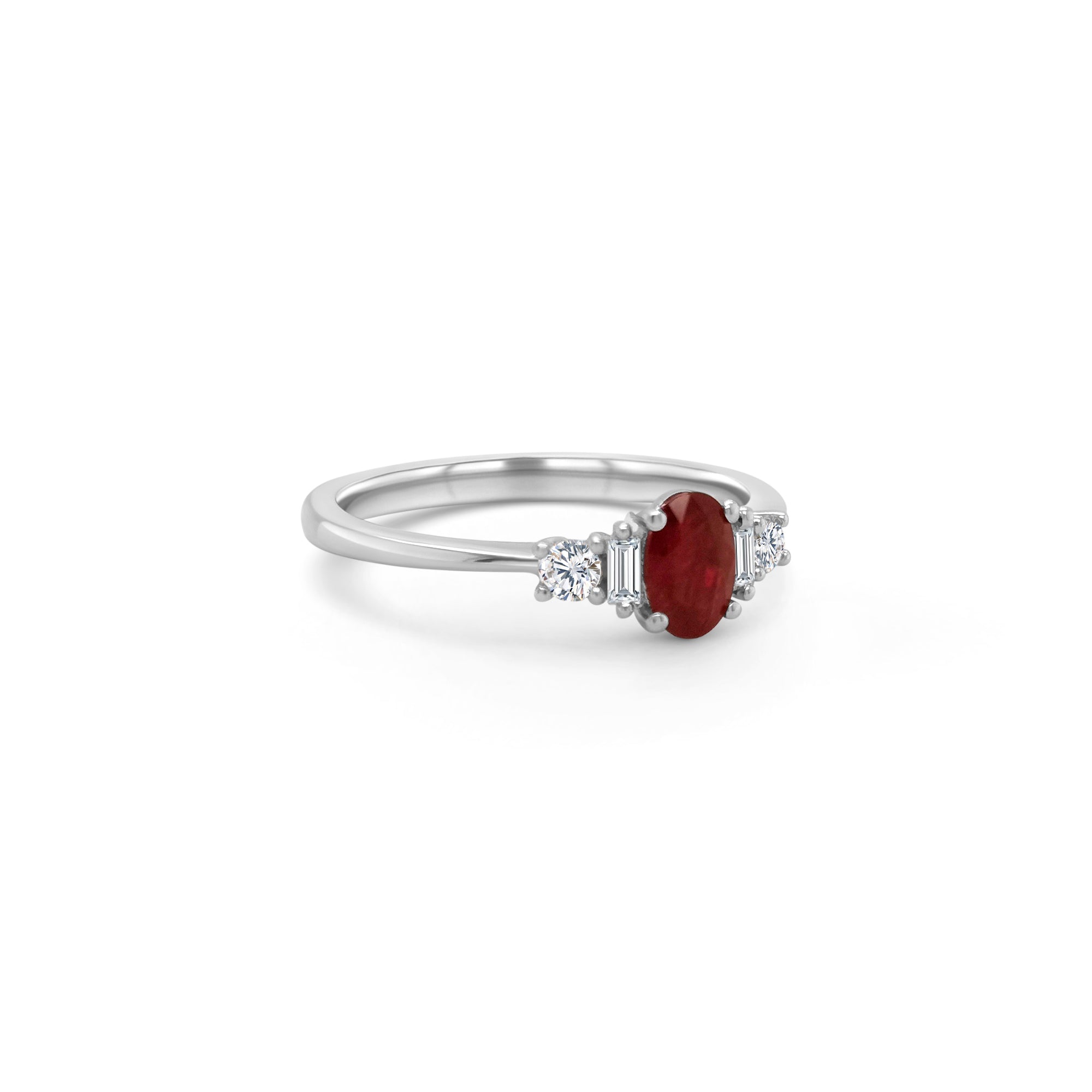 An elegant, oval ruby ring, adorned with sparkling diamonds, perfect for special occasions, adding sophistication and glamour to any ensemble.
