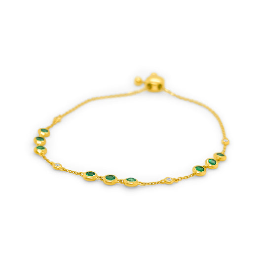 A luxurious, round emerald and diamond bracelet, showcasing exquisite craftsmanship, elegant emeralds glistening alongside brilliant diamonds, a timeless accessory capturing sophistication and grace.