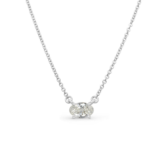 "Oval Cut Diamond Pendant," "Solitaire Diamond Necklace," "Diamond Jewelry," "Fine Jewelry," "Luxury Pendant," "Fashion Pendant," "Diamond Solitaire," "Oval Diamond Pendant," "Statement Necklace," "Classic Diamond Pendant," "Elegant Jewelry," "Special Occasion Pendant," "Diamond Necklace," "Timeless Jewelry," "Handcrafted Diamond Pendant."