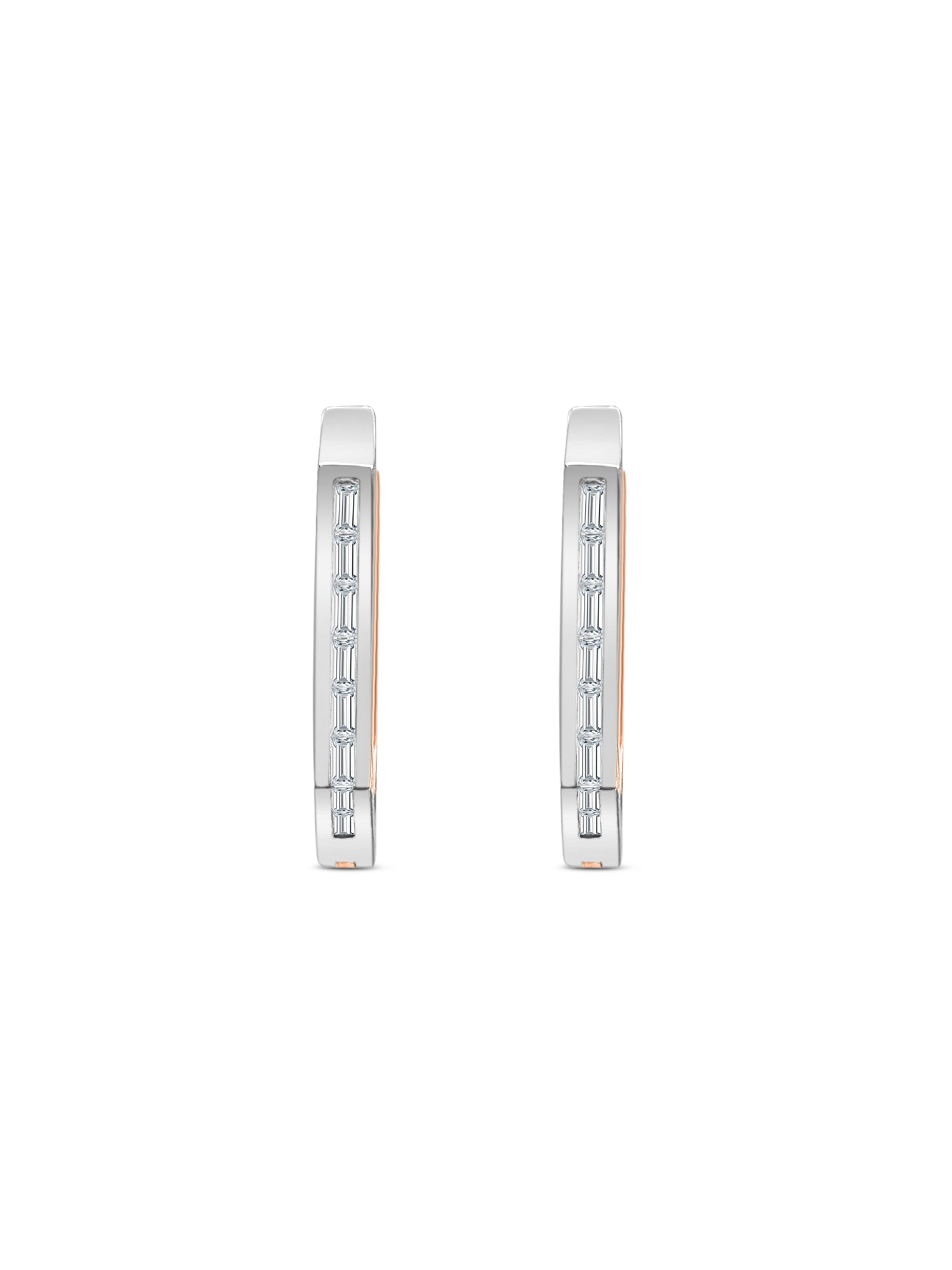 Elegant baguette cut diamond huggy earrings in white gold, Close-up of sparkling baguette cut diamond hoop earrings, Luxury diamond huggy earrings with baguette cut stones, Pair of baguette cut diamond huggies for women, Baguette diamond huggy earrings with secure clasp, Fine jewelry baguette diamond huggies in gold