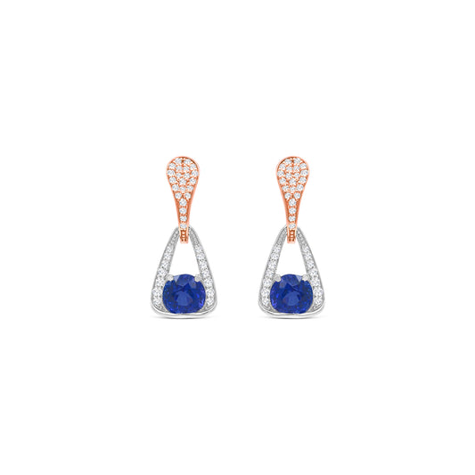 Elegant round tanzanite and diamond drop earrings in white gold, Close-up of sparkling tanzanite and diamond drop earrings, Luxury round tanzanite earrings with diamond accents, Women's tanzanite and diamond drop earrings, Fine jewelry round tanzanite and diamond drops, Handcrafted round tanzanite and diamond drop earrings