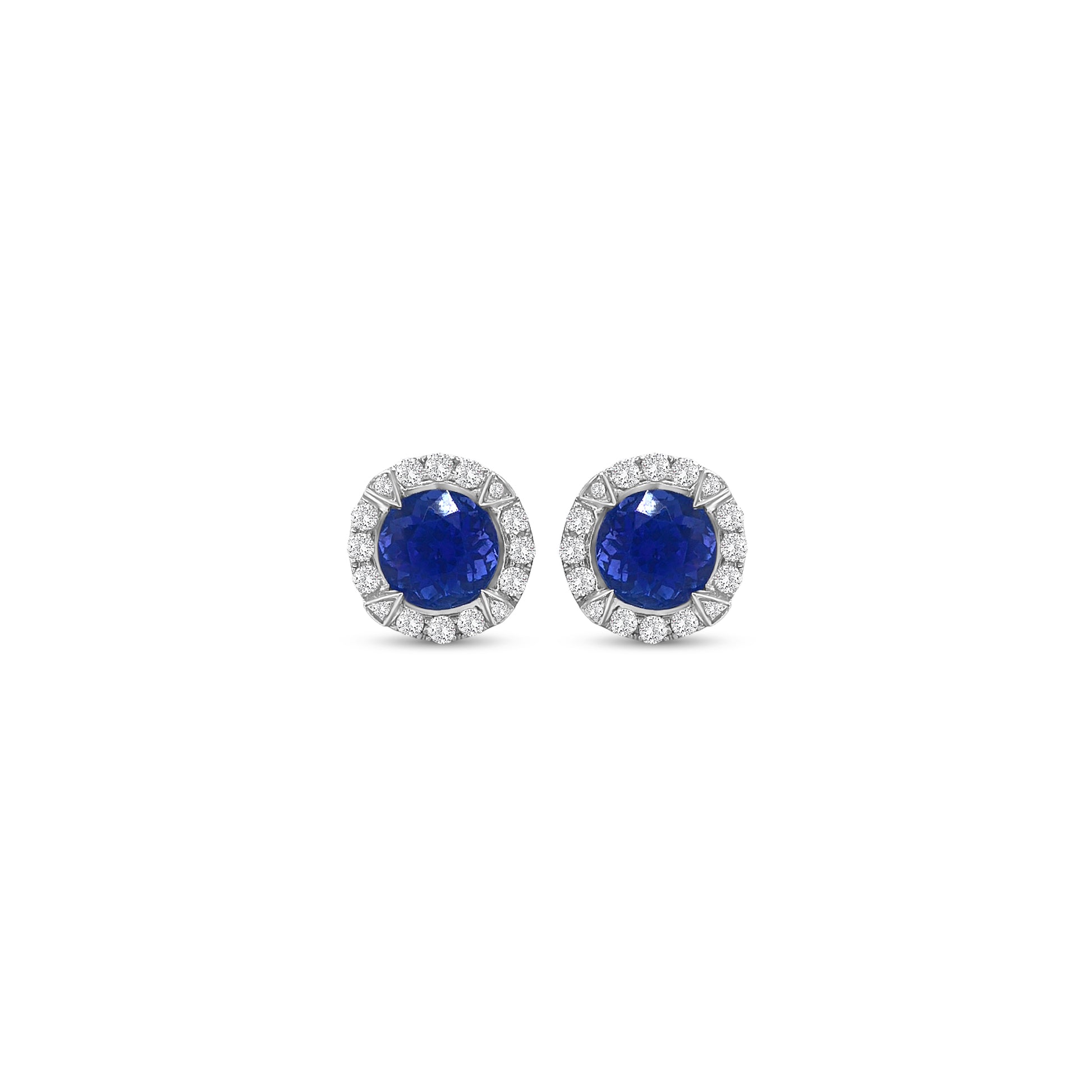 Round Tanzanite & Diamond Halo Stud Earrings" Tanzanite Detail: "Vibrant Round Tanzanite Gemstone" Diamond Halo: "Halo of Diamonds Surrounding Tanzanite" Earring Set: "Elegant Set of Tanzanite & Diamond Stud Earrings" Liner Options: "Earrings with Different Open Liners for Customization" Radiant Beauty: "Sparkling Tanzanite & Diamond Halo Stud Earrings"
