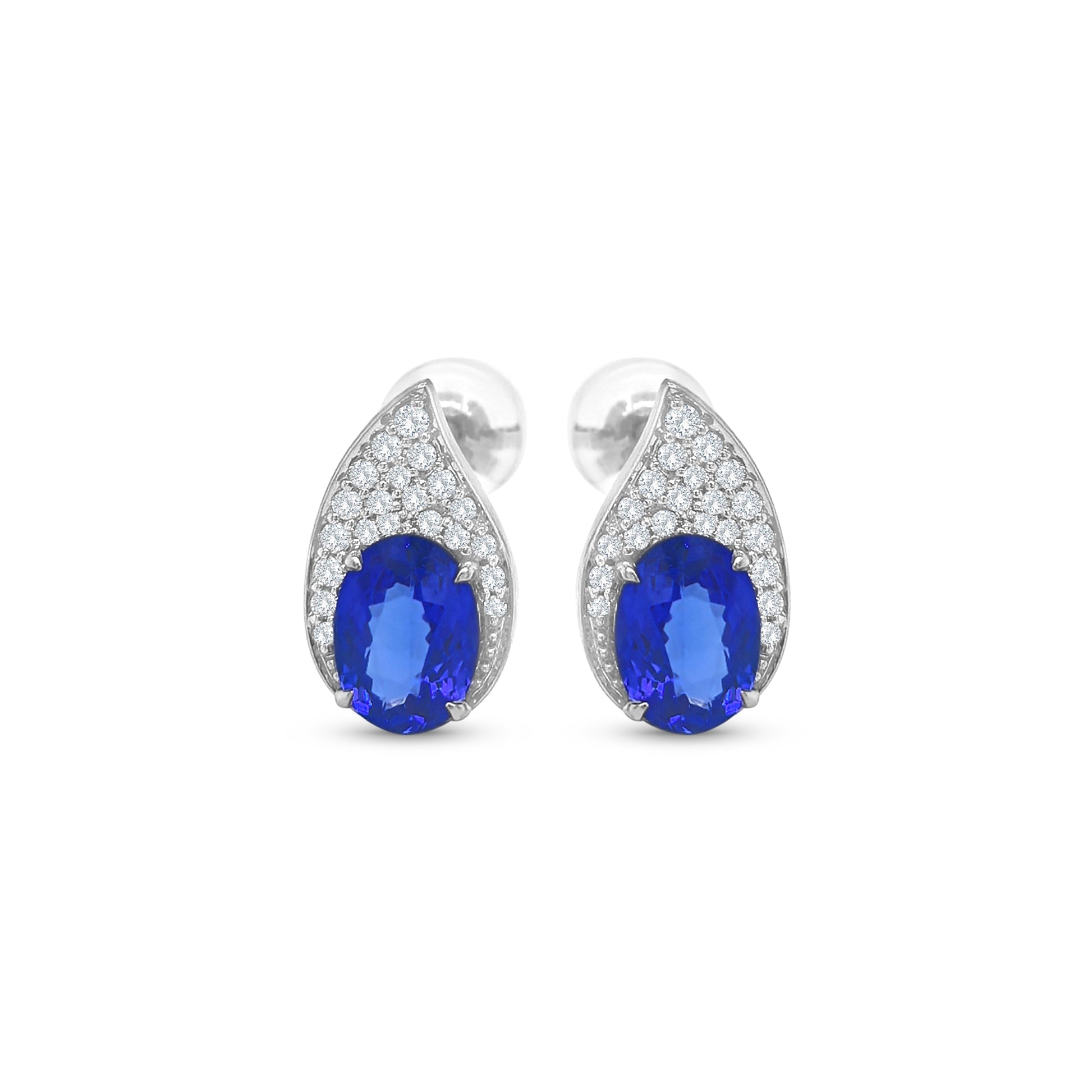 Tanzanite and diamond teardrop earrings, oval tanzanite diamond earrings, blue tanzanite and diamond stud earrings, white gold tanzanite teardrop earrings, luxury tanzanite and diamond earrings for women, elegant blue gemstone diamond earrings, natural tanzanite and diamond cluster earrings, fine jewelry tanzanite diamond earrings, sapphire blue tanzanite and diamond earrings, teardrop design tanzanite and diamond earrings.