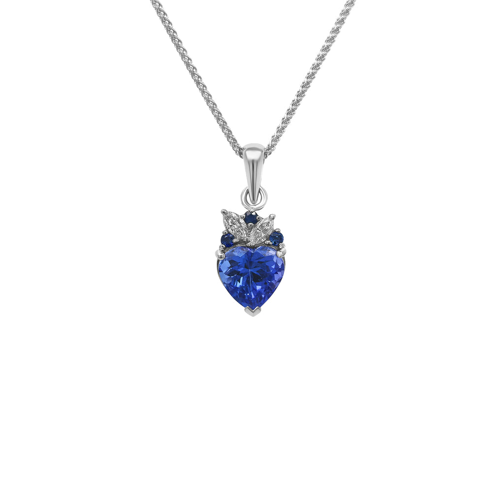 Make a statement with our heart-shaped tanzanite gemstone pendant, framed by dazzling sapphires and marquise diamonds.