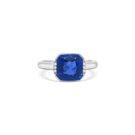 "Square Mixed Cut Tanzanite & Diamond Ring," "Luxury Square Cut Tanzanite and Diamond Ring," "Elegant Mixed Cut Tanzanite Diamond Engagement Ring," "Square Tanzanite and Diamond Cocktail Ring," "Exquisite Square Mixed Cut Tanzanite & Diamond Ring," "Fine Jewelry Square Tanzanite and Diamond Ring," "Unique Square Mixed Cut Tanzanite Diamond Ring," "Beautiful Square Cut Tanzanite with Diamond Accents," "Timeless Square Mixed Cut Tanzanite & Diamond Ring," "Sparkling Square Tanzanite and Diamond Ring."