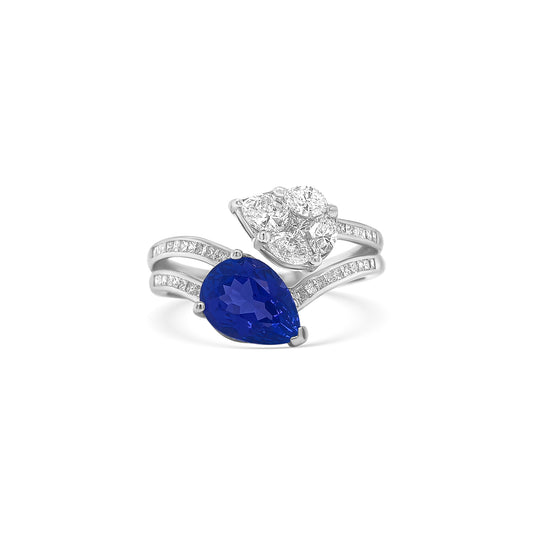 "Tanzanite & Diamond Cluster Ring," "Exquisite Tanzanite and Diamond Cluster Ring," "Luxurious Tanzanite Cluster Ring with Diamonds," "Elegant Tanzanite and Diamond Ring," "Fine Jewelry Tanzanite & Diamond Cluster Ring," "High-Quality Tanzanite and Diamond Ring," "Statement Tanzanite and Diamond Cluster Ring," "Sparkling Tanzanite & Diamond Ring," "Beautiful Tanzanite Cluster Ring with Diamonds," "Fashionable Tanzanite and Diamond Ring."