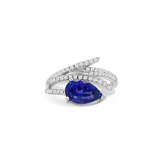 A breathtaking pear-shaped tanzanite gemstone paired with dazzling diamonds in an elegant dress ring — perfect for any refined occasion.