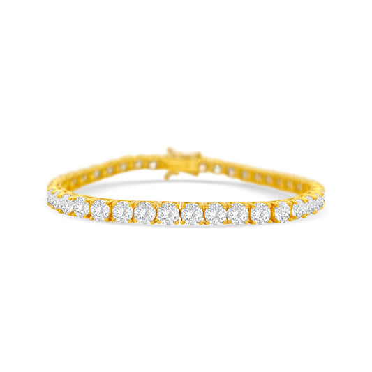 "Classic Diamond Tennis Bracelet with round brilliant diamonds", "Elegant tennis bracelet featuring a continuous row of diamonds", "Close-up of Diamond Tennis Bracelet clasp and setting", "Luxury Diamond Tennis Bracelet in white gold", "Sparkling Diamond Tennis Bracelet for everyday elegance"