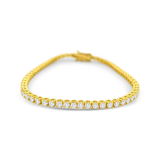 "Classic Diamond Tennis Bracelet with round brilliant diamonds", "Elegant tennis bracelet featuring a continuous row of diamonds", "Close-up of Diamond Tennis Bracelet clasp and setting", "Luxury Diamond Tennis Bracelet in white gold", "Sparkling Diamond Tennis Bracelet for everyday elegance"