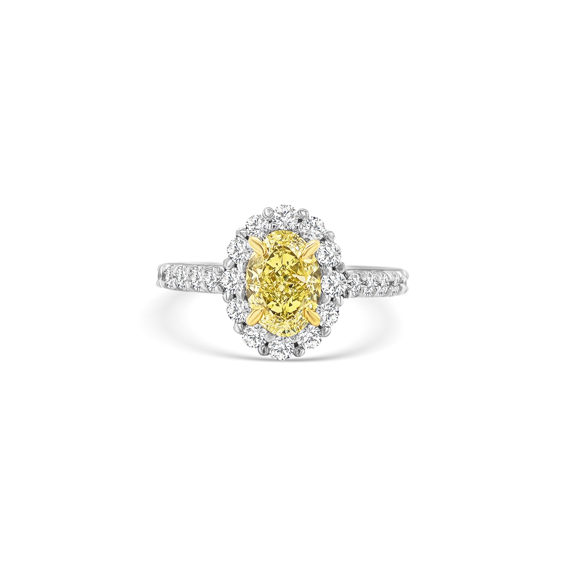Discover timeless elegance with this Fancy Yellow Oval and Floral Diamond Halo Ring. A stunning blend of luxury and craftsmanship, perfect for any special occasion