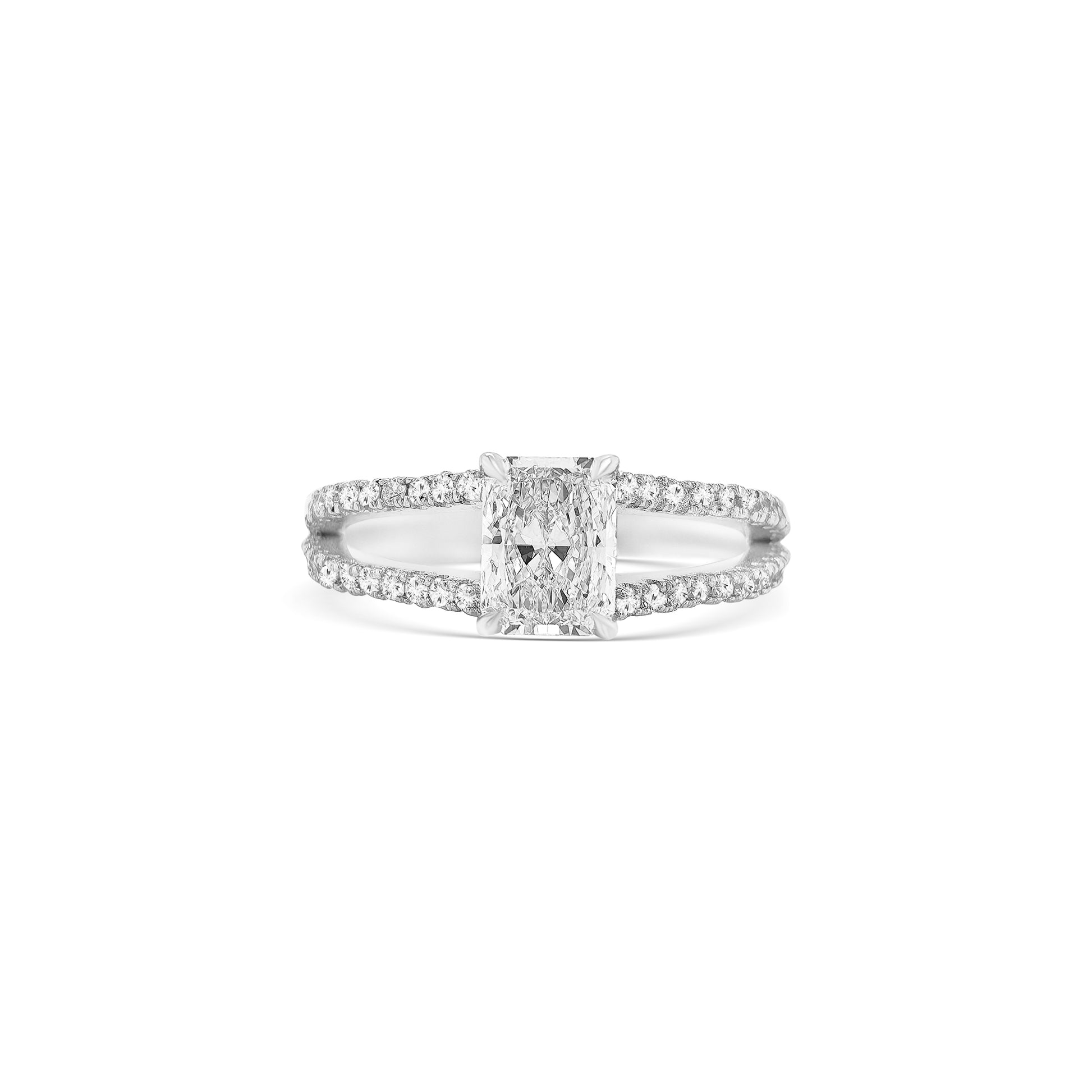 Split Shank Radiant Cut Diamond Ring showcases a mesmerizing center diamond, perfectly complemented by a delicate split shank band. Crafted for brilliance and elegance, this design symbolizes the beauty of commitment and forever.