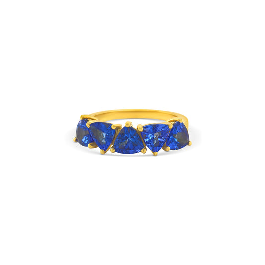 trillion tanzanite ring, half eternity ring, tanzanite eternity band, trillion cut gemstone ring, women’s tanzanite jewelry, fine gemstone ring, luxury eternity band, white gold tanzanite ring, elegant gemstone eternity ring, tanzanite half band