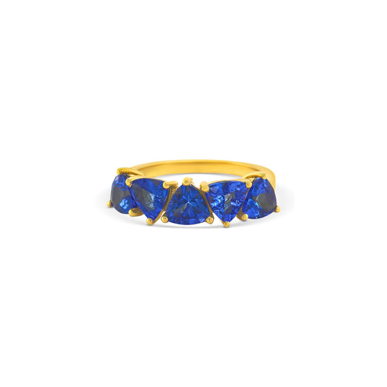 trillion tanzanite ring, half eternity ring, tanzanite eternity band, trillion cut gemstone ring, women’s tanzanite jewelry, fine gemstone ring, luxury eternity band, white gold tanzanite ring, elegant gemstone eternity ring, tanzanite half band