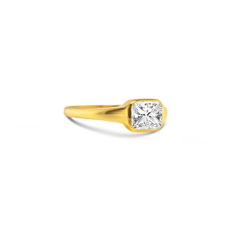 radiant cut diamond ring, radiant solitaire ring, radiant diamond engagement ring, yellow gold radiant diamond ring, elegant diamond jewelry, radiant cut fine jewelry, women’s radiant cut diamond ring, luxury diamond solitaire, modern radiant cut ring, radiant cut bridal jewelry