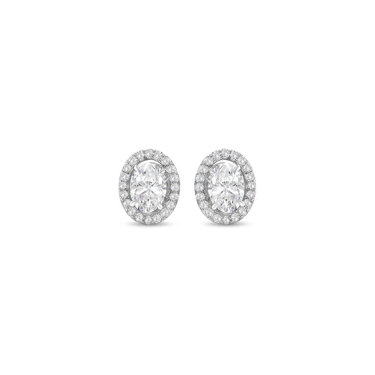 oval diamond halo earrings, diamond stud earrings, oval cut diamond jewelry, halo diamond earrings, elegant diamond studs, women’s fine jewelry, classic diamond earrings, oval halo stud earrings, luxury diamond jewelry, sparkling diamond earrings