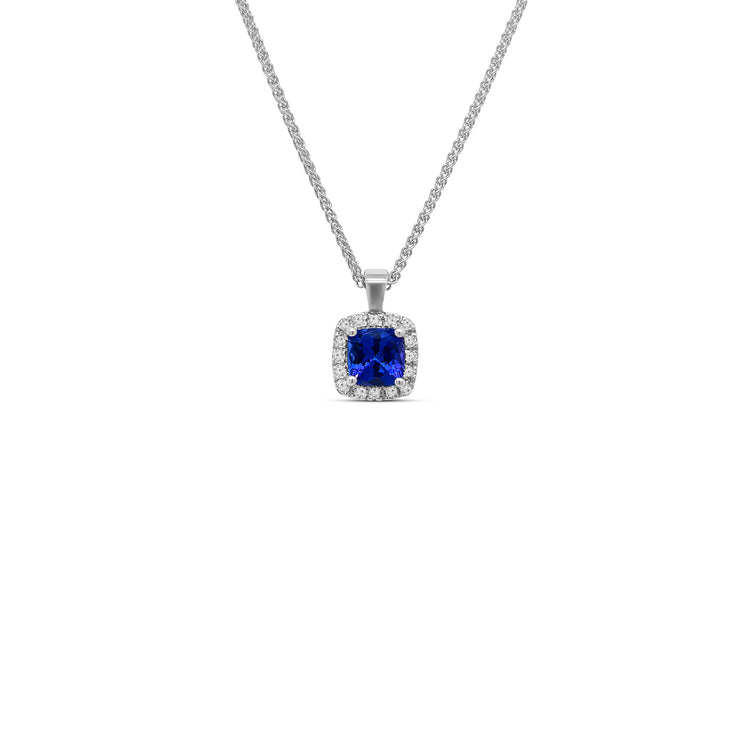 cushion cut tanzanite pendant, tanzanite and diamond halo necklace, cushion cut gemstone pendant, elegant tanzanite jewelry, luxury gemstone pendant, white gold tanzanite pendant, cushion tanzanite diamond jewelry, fine jewelry pendant, halo diamond necklace, women’s gemstone jewelry