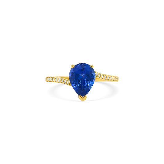 pear shape tanzanite ring, pear cut gemstone ring, tanzanite and diamond ring, elegant pear cut tanzanite jewelry, luxury gemstone ring, women’s tanzanite diamond ring, pear shaped engagement style ring, fine gemstone jewelry, white gold tanzanite and diamond ring, sparkling pear cut tanzanite ring
