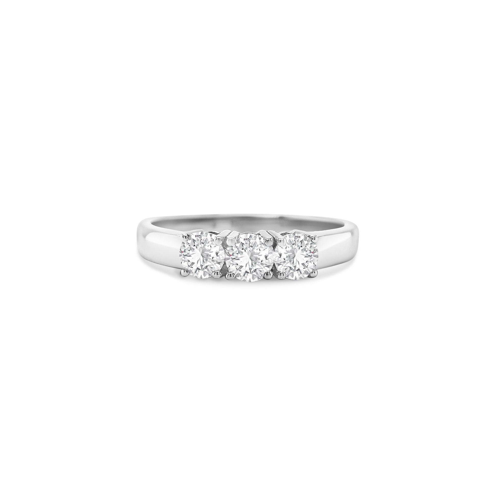 round brilliant diamond ring, trilogy diamond ring, white gold diamond ring, three stone diamond ring, white gold trilogy ring, round cut diamond ring, engagement trilogy ring, white gold engagement ring, classic diamond trilogy ring, bridal trilogy ring white gold
