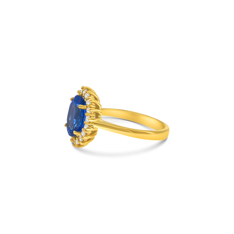 Oval Cut Tanzanite Diamond Halo Ring