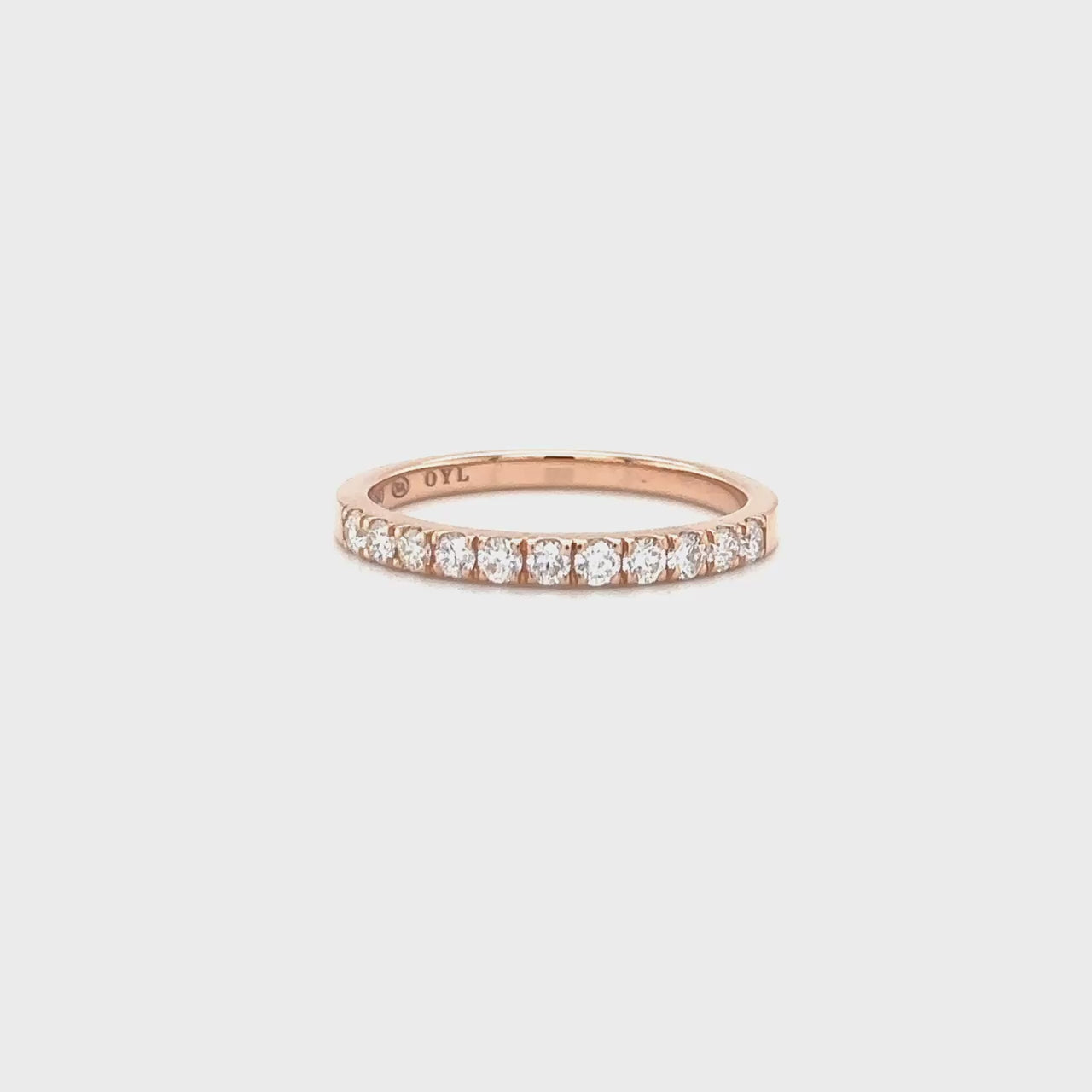  Round brilliant, half eternity, diamond ring.