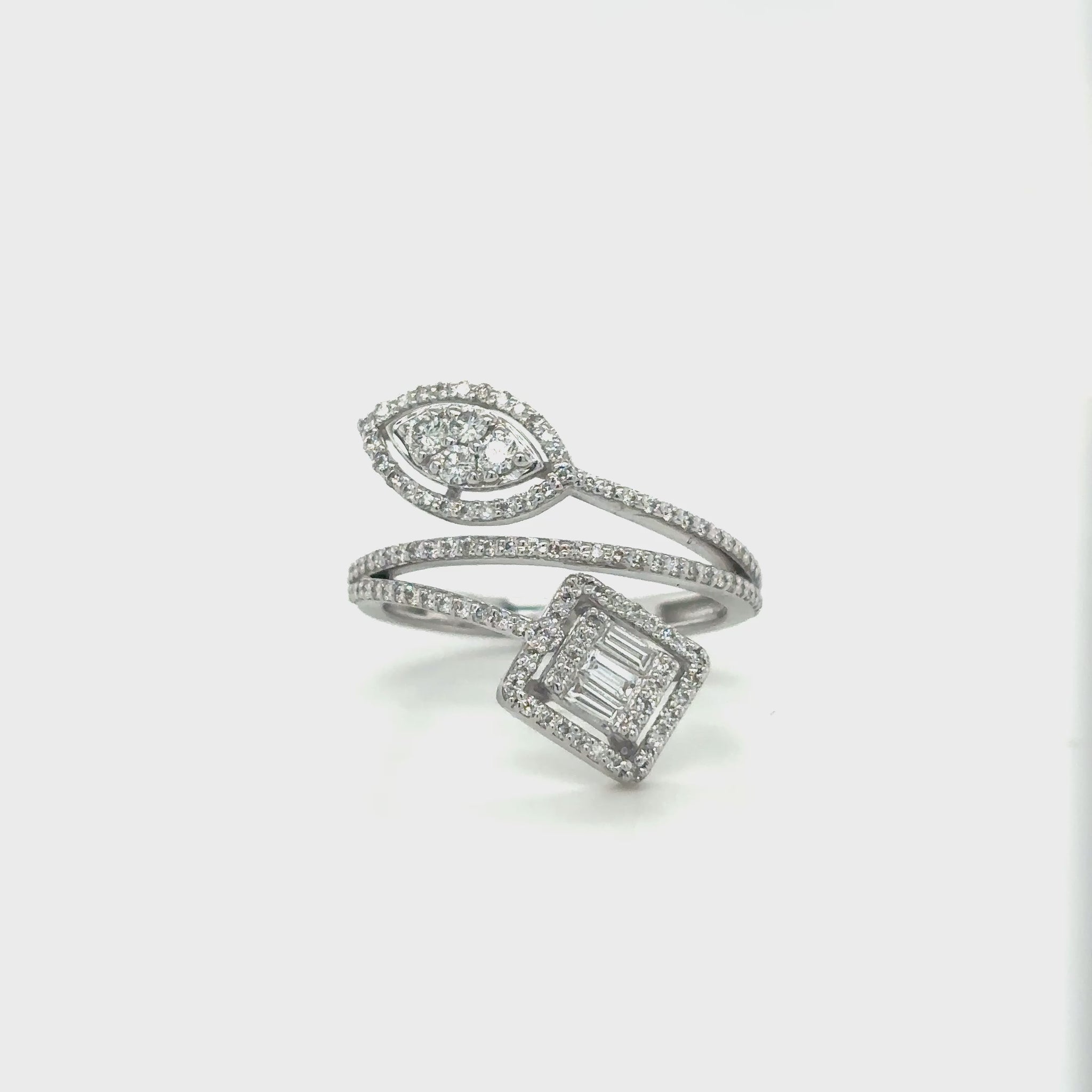 Round brilliant-cut diamond ring set in white gold, showcasing a classic and elegant design with a sparkling center stone.