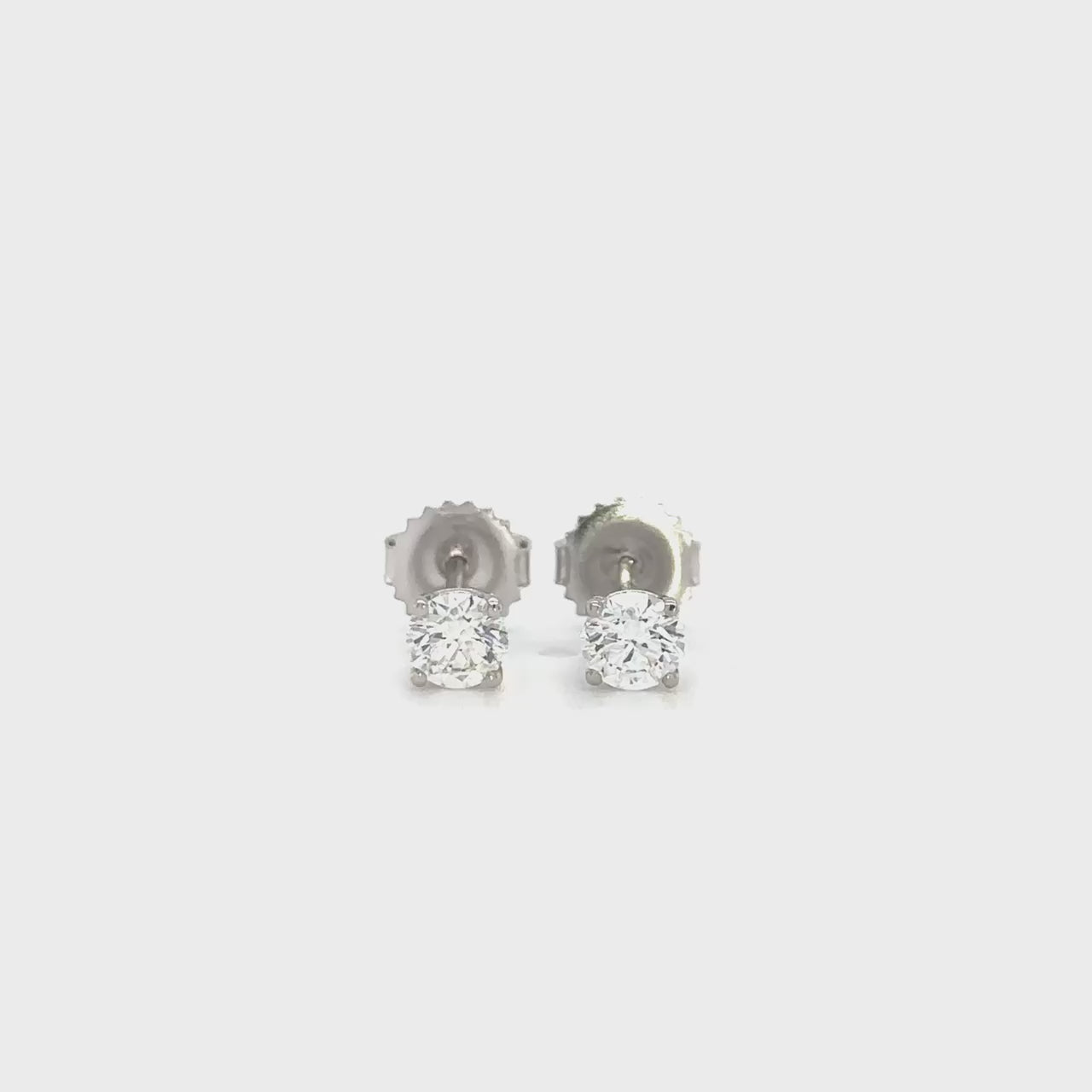 Round Brilliant Diamond Stud Earrings, Sparkling Diamond Studs, Classic Diamond Earrings, Timeless Diamond Studs, Elegant Stud Earrings, Brilliant Cut Diamond Earrings, Luxurious Diamond Studs, Glamorous Diamond Stud Earrings, Stunning Diamond Stud Earrings, Sophisticated Diamond Studs.