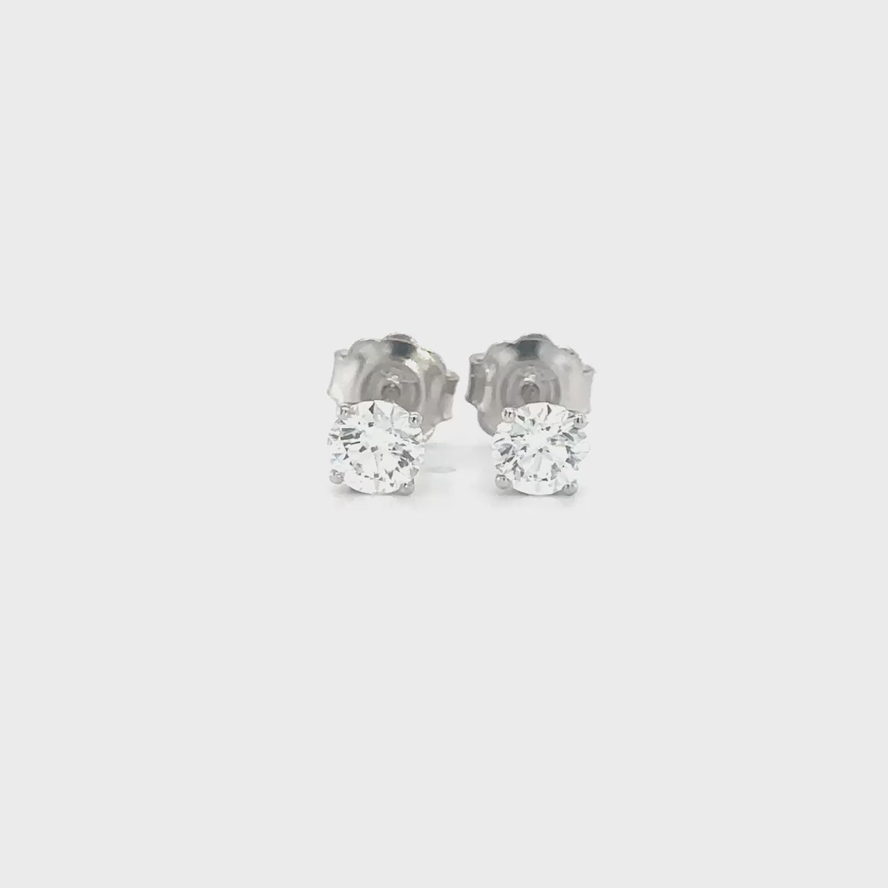 "Round Brilliant Diamond Stud Earrings, Sparkling Round Diamond Stud Earrings, Elegant Round Diamond Stud Earrings, Classic Round Diamond Stud Earrings, Timeless Round Diamond Stud Earrings, High-Quality Round Diamond Stud Earrings, Brilliant Cut Diamond Stud Earrings, Round Cut Diamond Stud Earrings, Stunning Diamond Stud Earrings, Luxurious Diamond Stud Earrings, Women's Round Diamond Stud Earrings, Men's Round Diamond Stud Earrings, Genuine Round Diamond Stud Earrings,