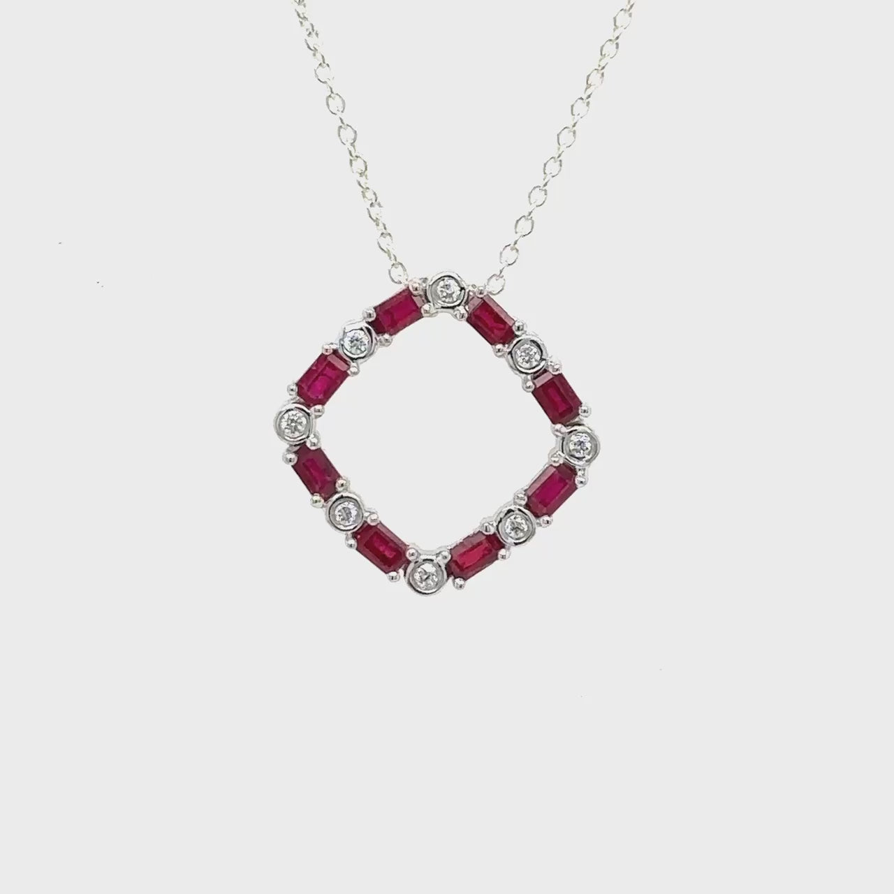 A luxurious baguette ruby pendant, sparkling with diamonds, exuding elegance and charm, a timeless piece of jewelry, perfect for any occasion