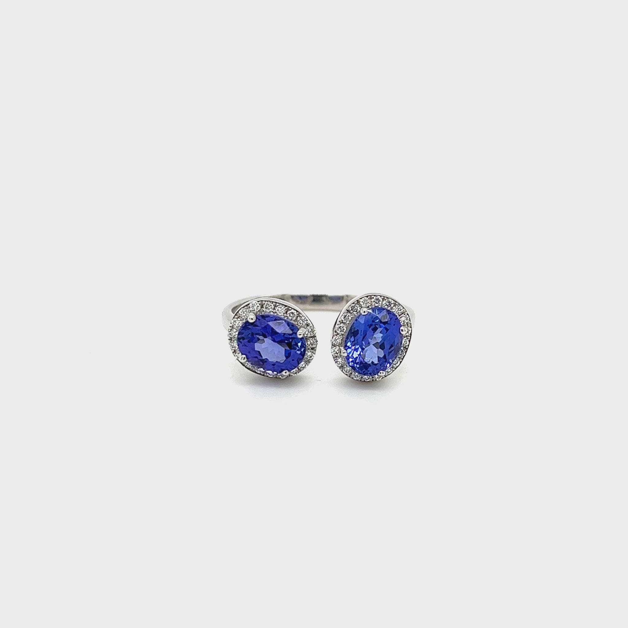Toi Et Moi Tanzanite and Halo Diamond Ring - Front View Tanzanite and Diamond Ring - Side View Elegant Toi Et Moi Ring with Halo Diamonds Handcrafted Tanzanite and Diamond Jewelry Unique Anniversary or Engagement Ring Brilliant Halo Diamonds on Tanzanite Ring Luxurious Tanzanite Gemstone Ring Fine Jewelry - Toi Et Moi Style Statement Ring with Tanzanite and Diamonds Sparkling Tanzanite and Diamond Combination