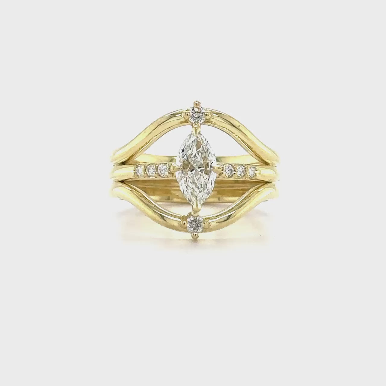 "Marquise Cut Diamond Ring," "Diamond Engagement Ring," "Marquise Diamond Ring," "Fine Jewelry," "Luxury Ring," "Fashion Ring," "Sparkling Diamond Ring," "Statement Ring," "Elegant Jewelry," "Special Occasion Ring," "Diamond Jewelry," "Timeless Jewelry," "Handcrafted Ring," "Unique Diamond Ring," "Classic Marquise Ring."
