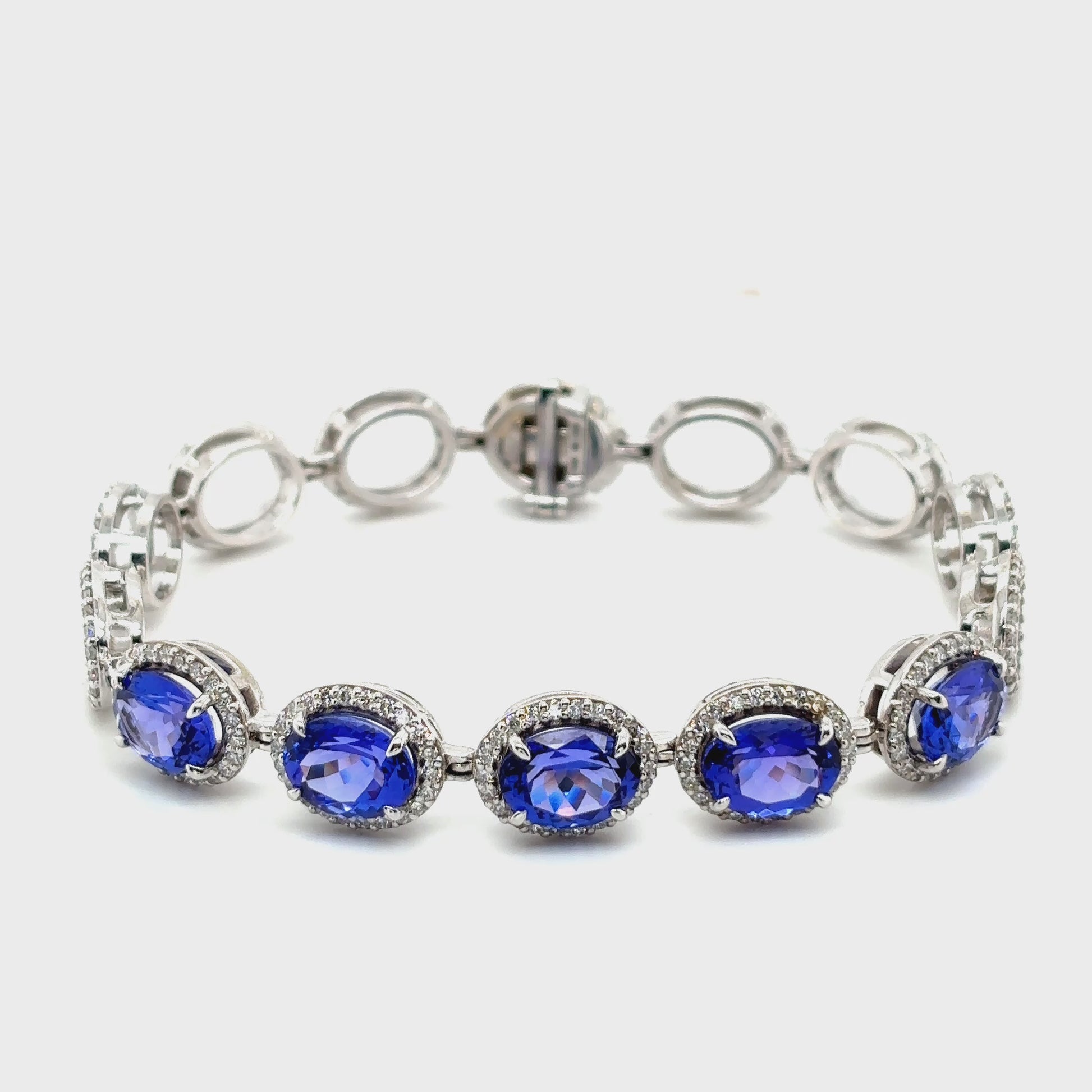 Discover the timeless elegance of our Oval Tanzanite & Diamond Bracelet, a luxurious piece perfect for special occasions or everyday sophistication
