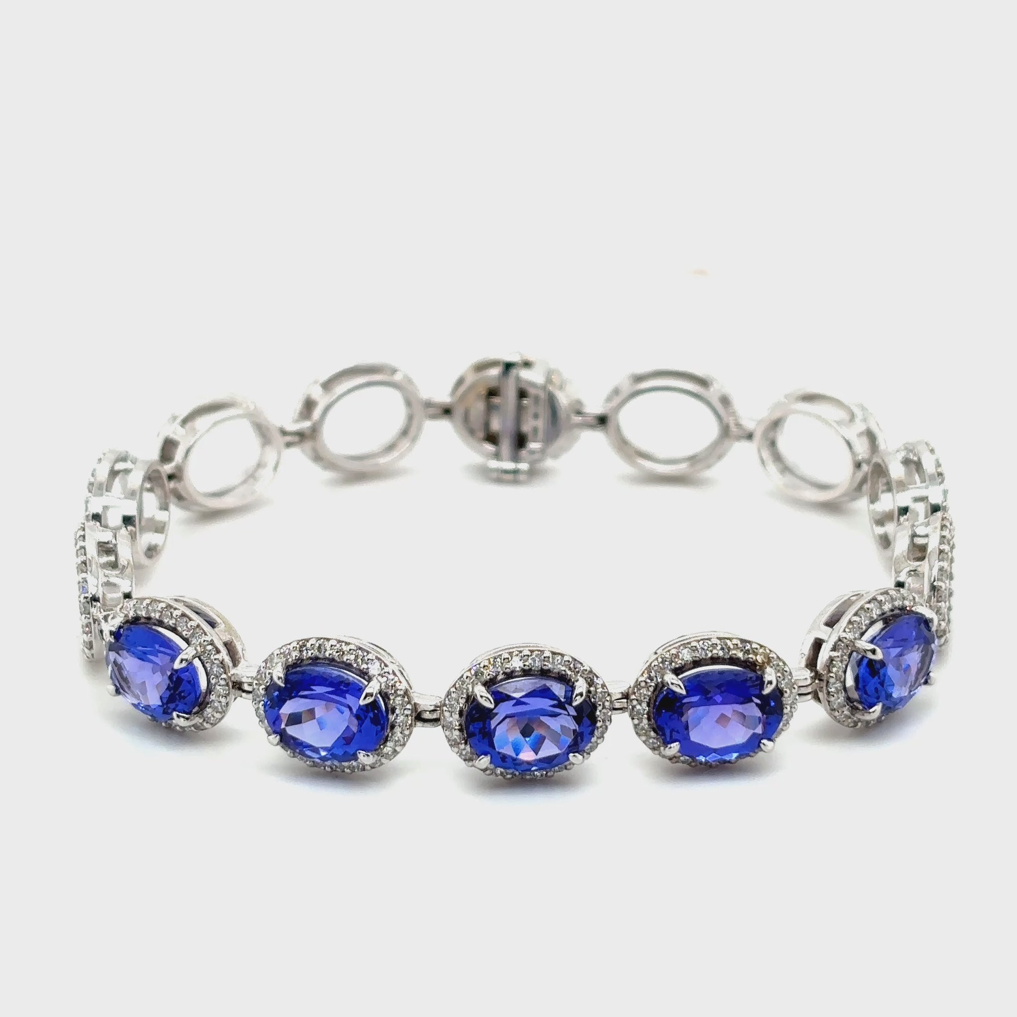Discover the timeless elegance of our Oval Tanzanite & Diamond Bracelet, a luxurious piece perfect for special occasions or everyday sophistication