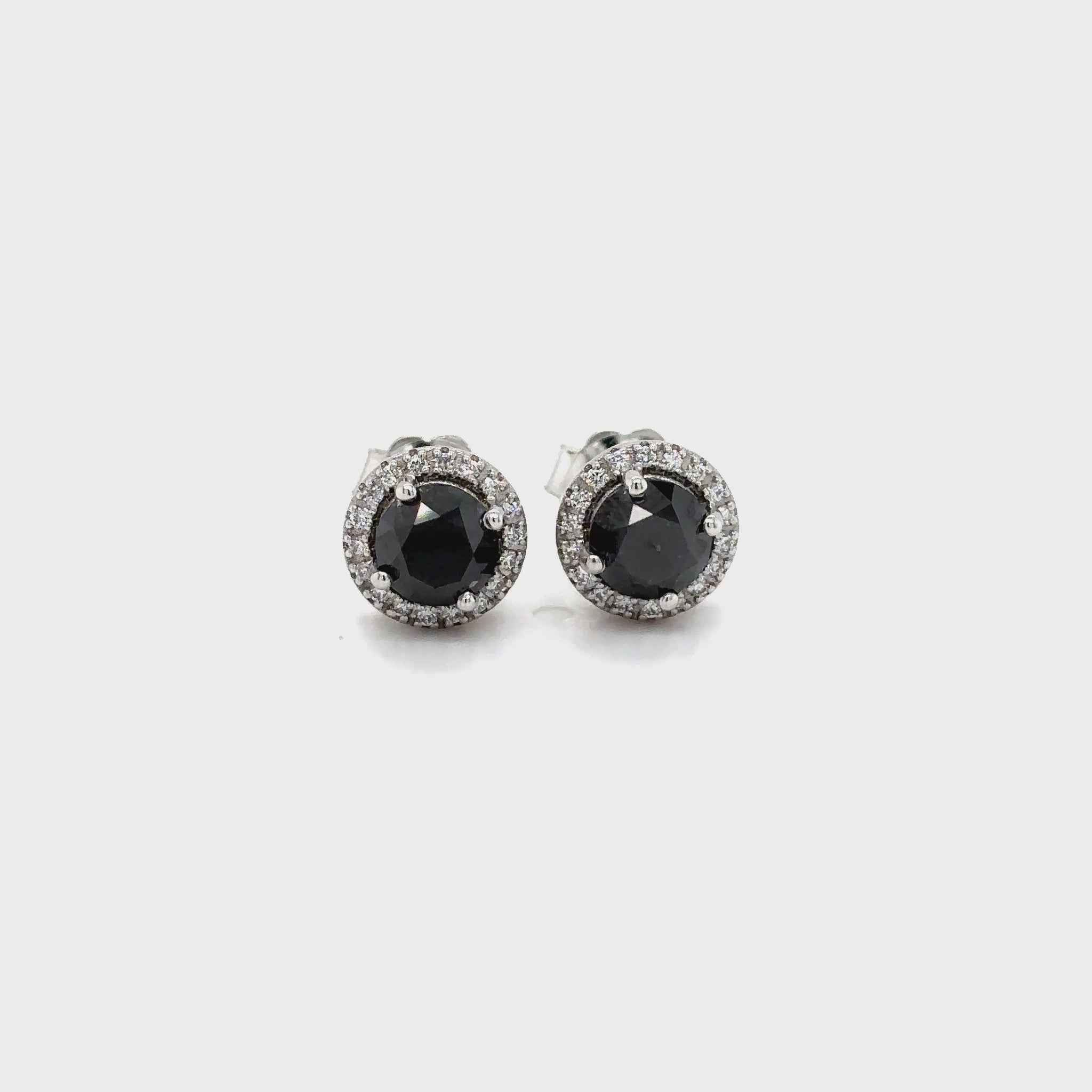 Round Cut Black Diamond & White Diamond Halo Stud Earrings, Black and White Diamond Halo Stud Earrings, Round Black Diamond Studs with Halo, Luxury Black Diamond Earrings, Fine Jewelry Black and White Diamond Earrings, Elegant Black Diamond Halo Studs, Round Cut Black Diamond Earrings, Black Diamond and White Diamond Studs