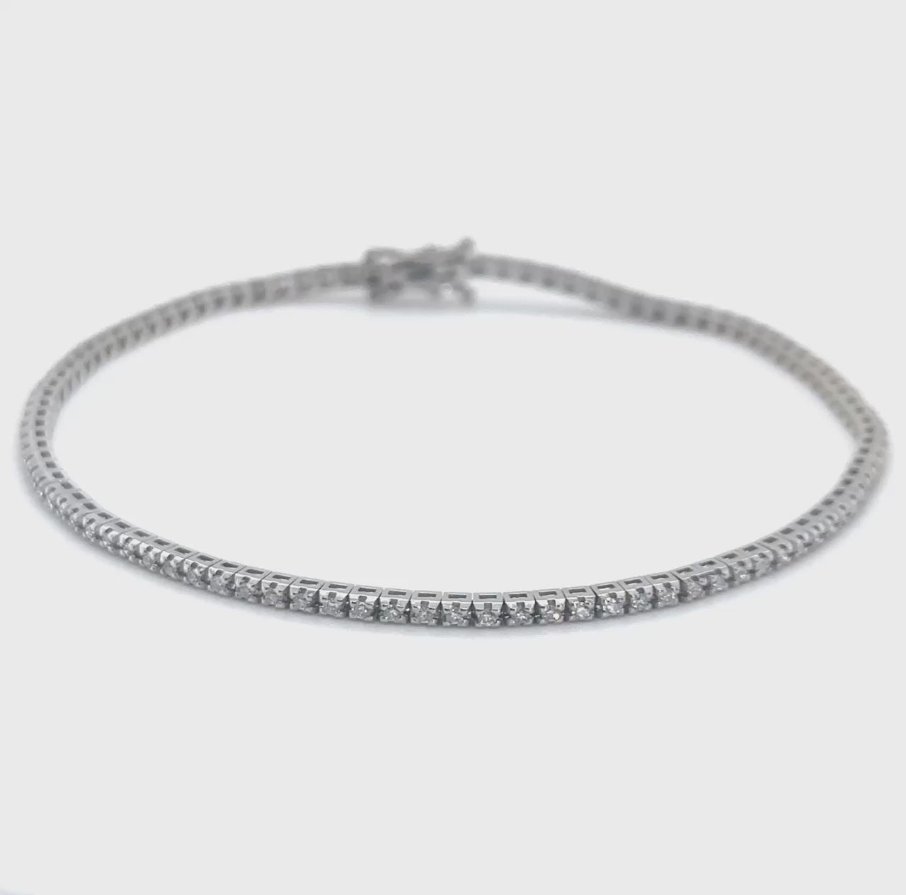 A stunning diamond tennis bracelet, featuring brilliant diamonds, perfect for any occasion, adding elegance and glamour to your look, a timeless accessory, sparkling with every movement, exuding sophistication and luxury, a must-have piece for every jewelry collection.