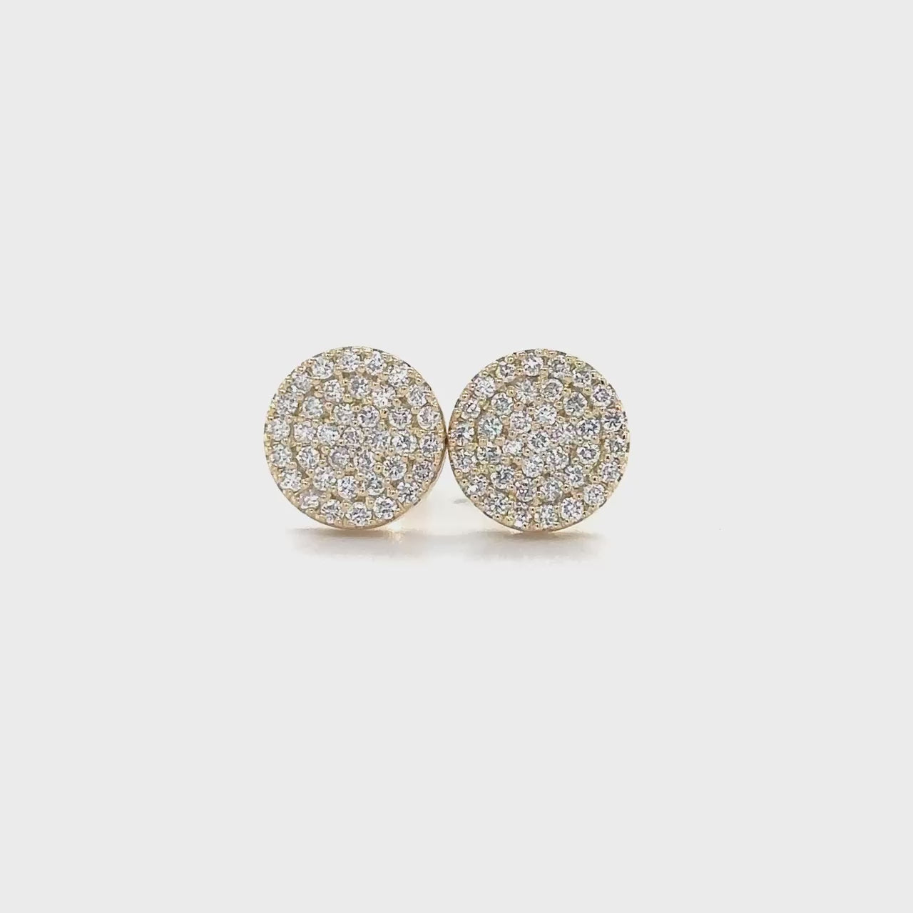 Round Brilliant Diamond Stud Earrings, timeless elegance, sparkling brilliance, luxurious accessories, classic sophistication, versatile adornments, exquisite craftsmanship, eye-catching beauty, elegant simplicity, radiant allure, enduring style.