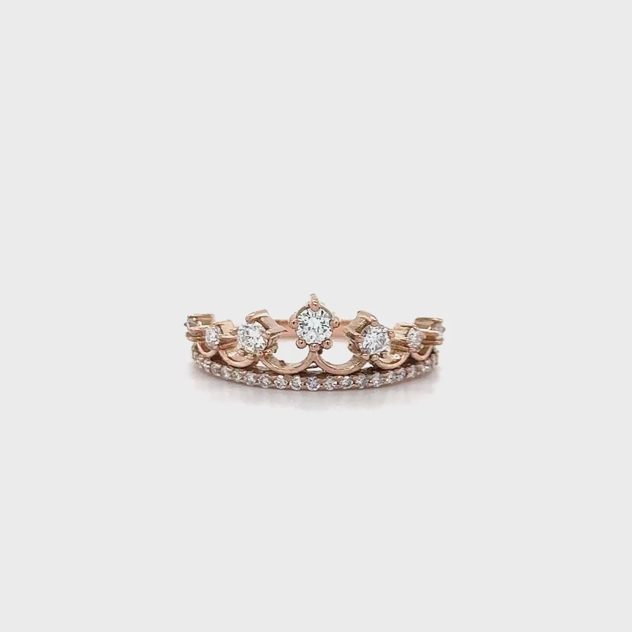 A stunning, crown-shaped, round brilliant diamond ring, gleaming with elegance, sophistication, and timeless beauty, perfect for engagements, weddings, or any special occasion.