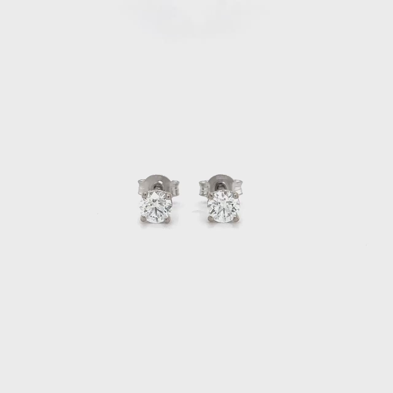 "Round Brilliant Diamond Stud Earrings, Sparkling Round Diamond Stud Earrings, Elegant Round Diamond Stud Earrings, Classic Round Diamond Stud Earrings, Timeless Round Diamond Stud Earrings, High-Quality Round Diamond Stud Earrings, Brilliant Cut Diamond Stud Earrings, Round Cut Diamond Stud Earrings, Stunning Diamond Stud Earrings, Luxurious Diamond Stud Earrings, Women's Round Diamond Stud Earrings, Men's Round Diamond Stud Earrings, Genuine Round Diamond Stud Earrings, 