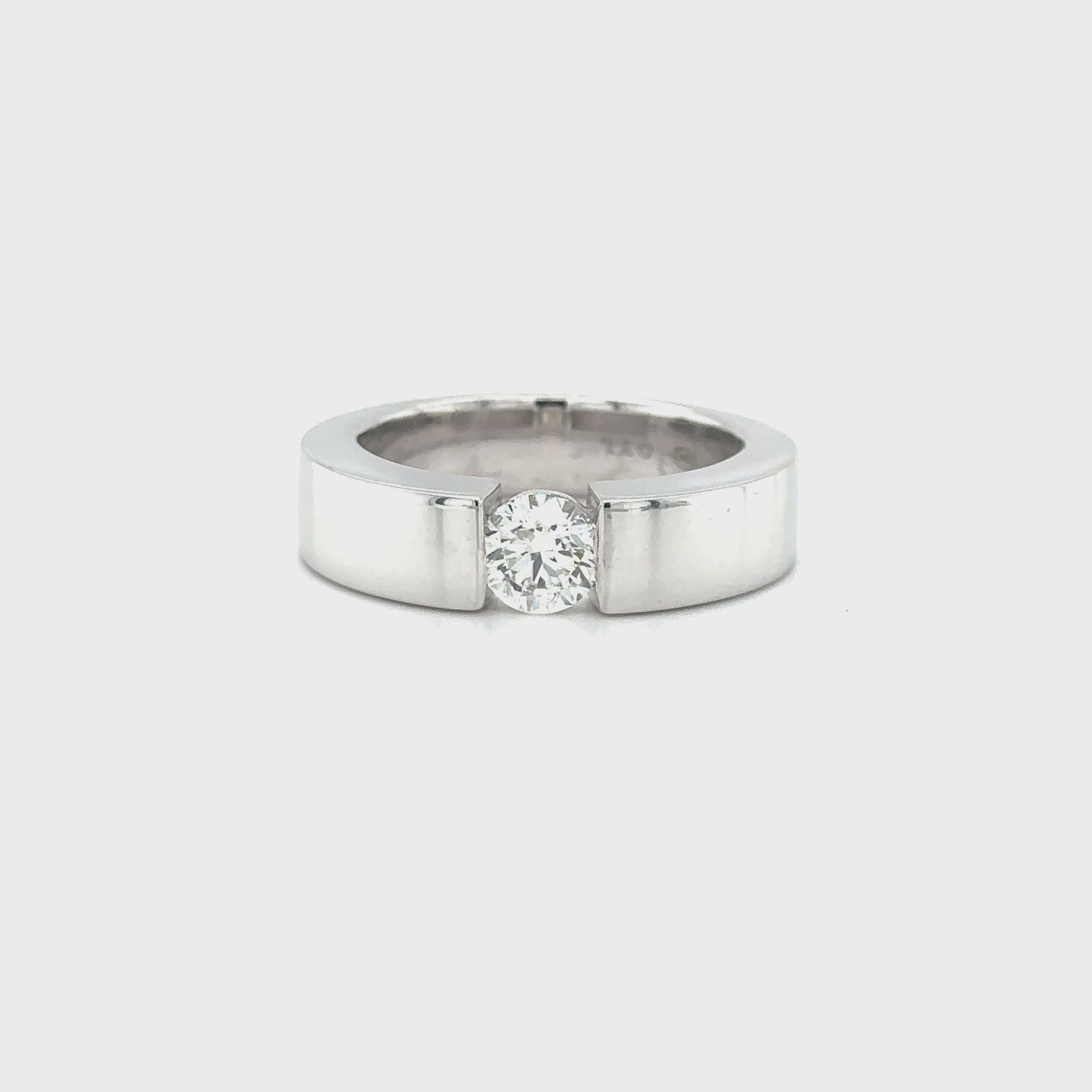 "White Gold Diamond Band," "Exquisite White Gold Diamond Wedding Band," "Luxurious Diamond Band in White Gold," "Elegant White Gold Diamond Ring," "Fine Jewelry White Gold Band with Diamonds," "High-Quality Diamond Wedding Band in White Gold," "Statement White Gold Diamond Band," "Sparkling Diamond Band in White Gold," "Beautiful White Gold Diamond Ring," "Fashionable Diamond Band in White Gold."