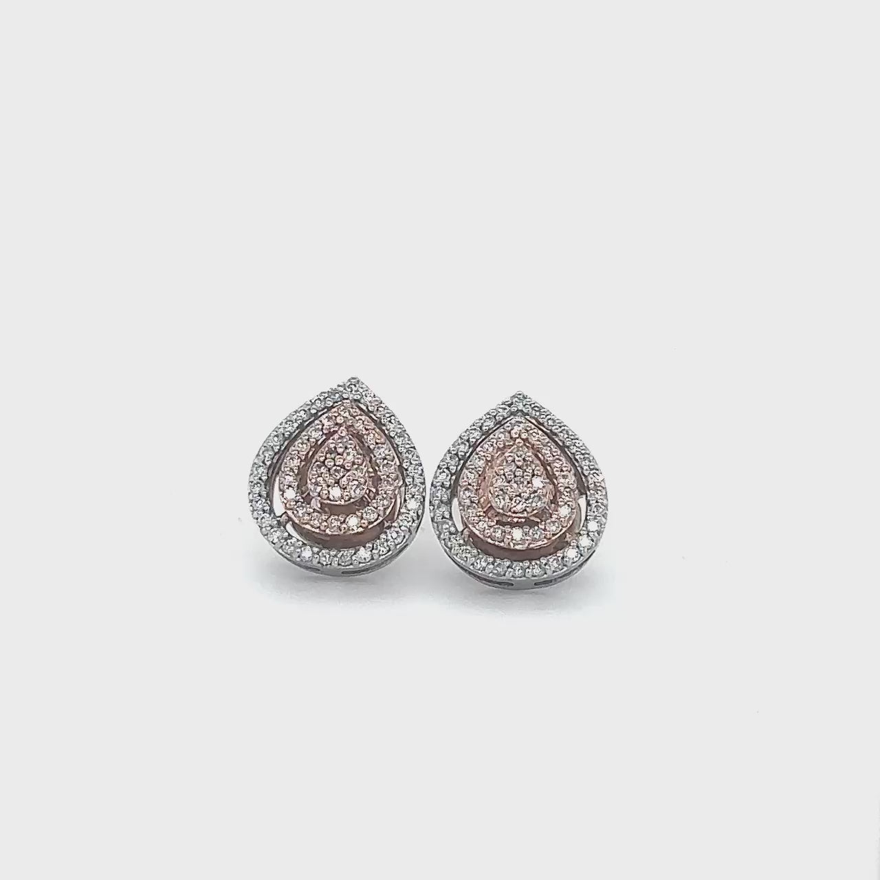 Tear drop halo diamond stud earrings, tear drop earrings, halo earrings, diamond stud earrings, jewelry, accessories, fashion accessories, women's jewelry, elegant earrings, glamorous earrings, luxury earrings