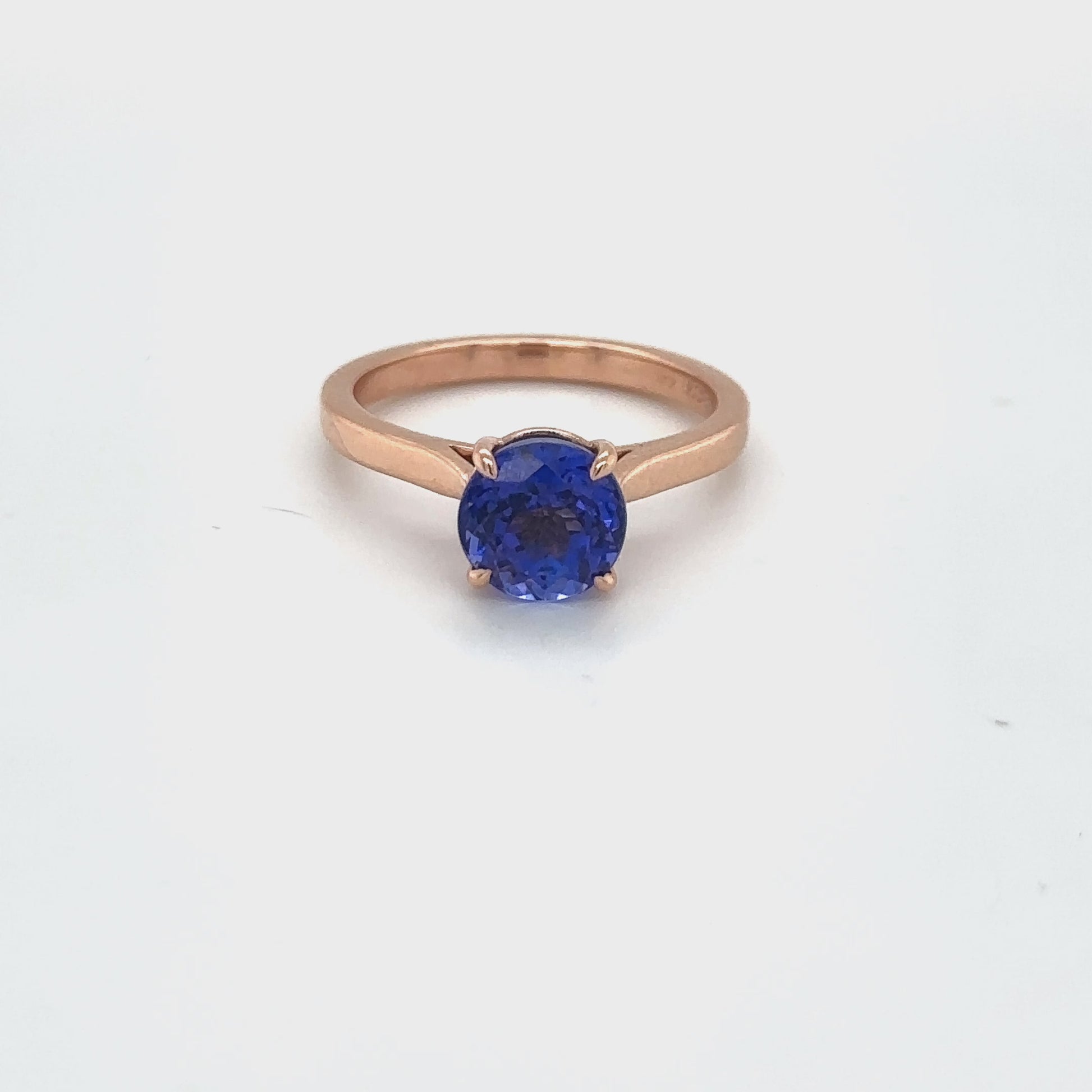 Round Tanzanite Solitaire Ring, Elegant Tanzanite Engagement Band, Stunning Gemstone Ring, Classic Tanzanite Solitaire, Timeless Tanzanite Jewelry, Dazzling Tanzanite Statement Piece