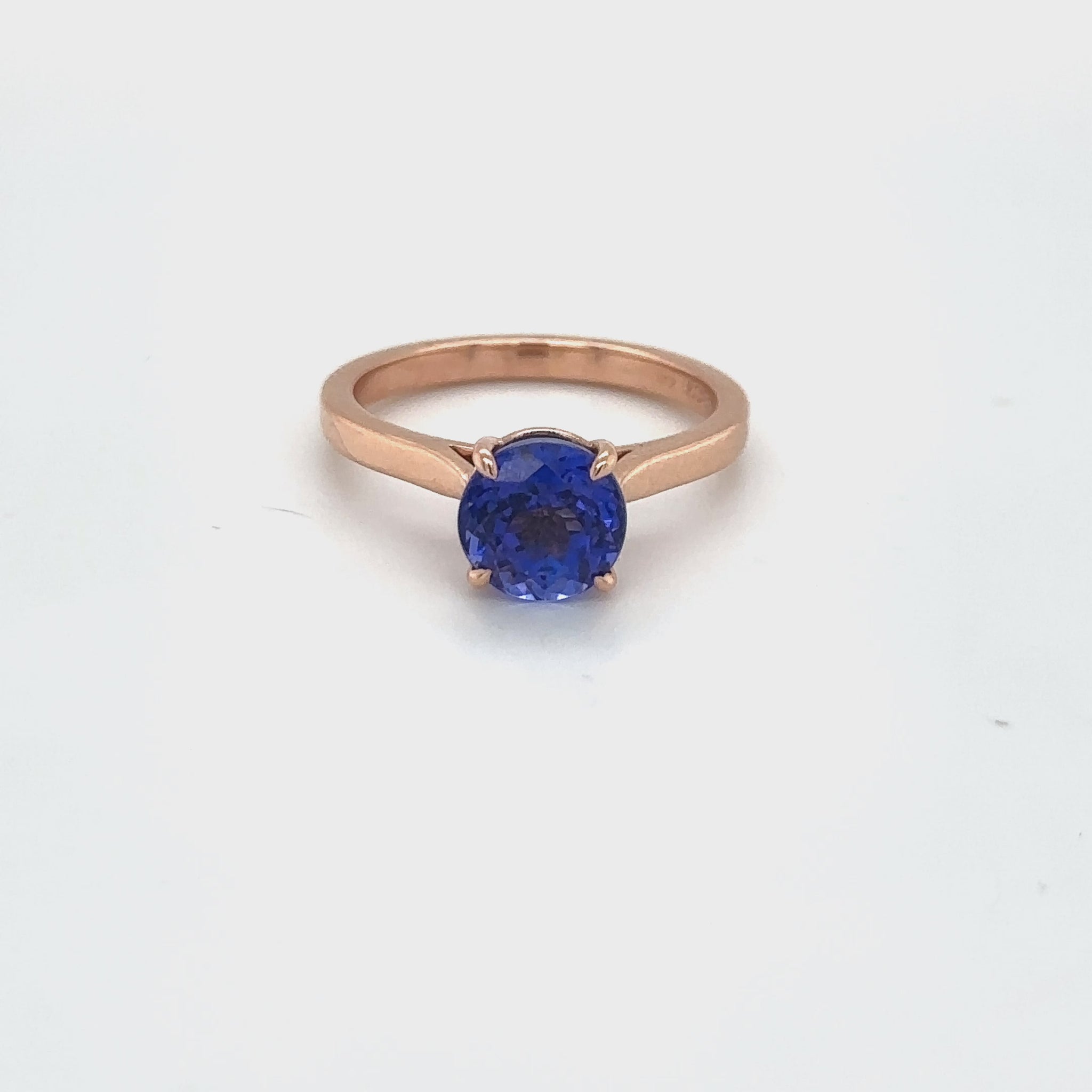 Round Tanzanite Solitaire Ring, Elegant Tanzanite Engagement Band, Stunning Gemstone Ring, Classic Tanzanite Solitaire, Timeless Tanzanite Jewelry, Dazzling Tanzanite Statement Piece
