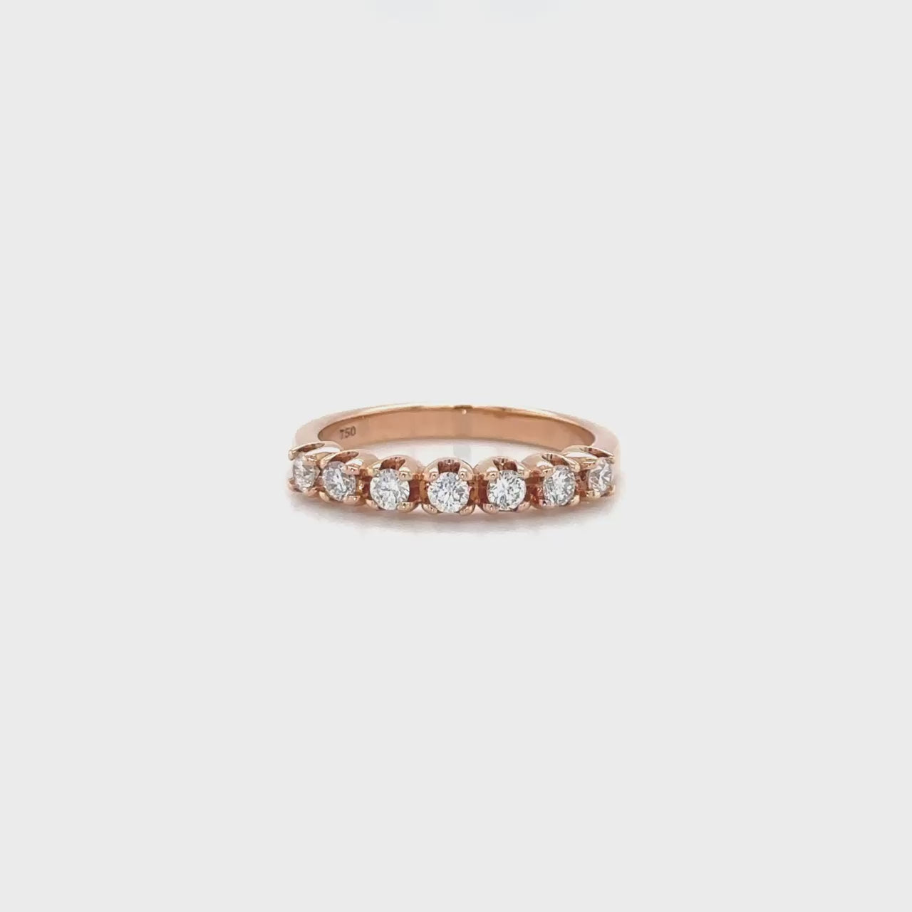 "Round Brilliant Half Eternity Diamond Ring," "Exquisite Round Brilliant Diamond Eternity Band," "Luxurious Half Eternity Diamond Ring," "Elegant Round Diamond Half Eternity Ring," "Fine Jewelry with Round Brilliant Diamonds," "High-Quality Half Eternity Diamond Ring," "Statement Round Brilliant Diamond Band," "Sparkling Round Brilliant Eternity Ring," "Beautiful Diamond Half Eternity Ring," "Fashionable Round Diamond Eternity Ring."