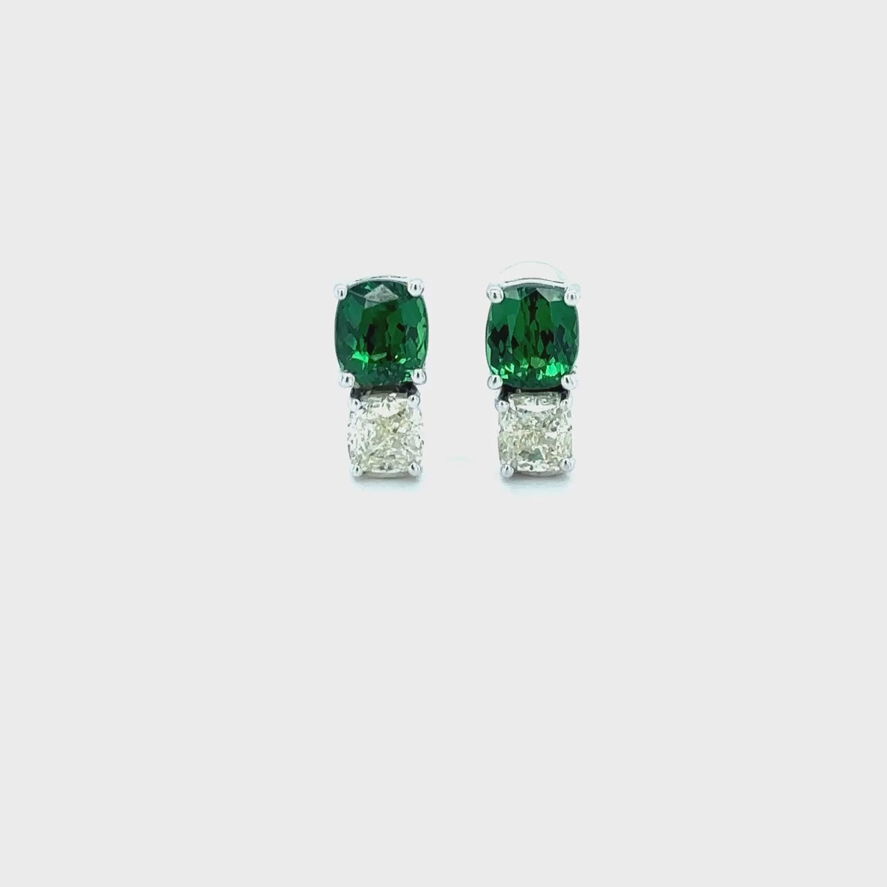 "Tsavorite & Diamond Stud Earrings," "Exquisite Tsavorite and Diamond Earrings," "Luxurious Diamond and Tsavorite Stud Earrings," "Elegant Tsavorite Diamond Stud Earrings," "Fine Jewelry Tsavorite and Diamond Studs," "High-Quality Tsavorite & Diamond Earrings," "Statement Tsavorite and Diamond Studs," "Sparkling Tsavorite and Diamond Stud Earrings," "Beautiful Tsavorite and Diamond Studs," "Fashionable Tsavorite & Diamond Stud Earrings."