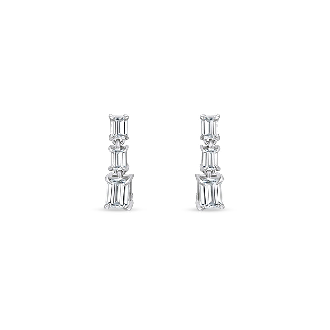  Emerald Cut Diamond Drop Earrings, sophisticated jewelry, elegant diamond earrings, sparkling gemstone drops, luxurious emerald-cut design, exquisite jewelry accessories, statement earrings, fine craftsmanship, glamorous diamond jewelry, radiant gemstone drops, timeless and refined style.