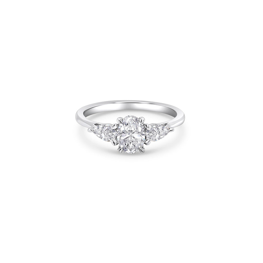 1.00ct Oval & Pear Shape Trilogy Diamond Ring ,A classic and timeless trilogy setting is always a great investment and an extremely popular choice when choosing a diamond engagement ring.  Symbolizing yesterday, today, and tomorrow.