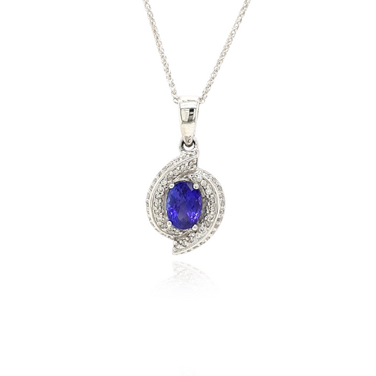 A captivating Oval Tanzanite pendant, intricately designed with a Diamond swirl, elegant Tanzanite and Diamond pendant, stylish swirl pendant with Oval Tanzanite and Diamonds, exquisite jewelry featuring an Oval Tanzanite and Diamond swirl design.